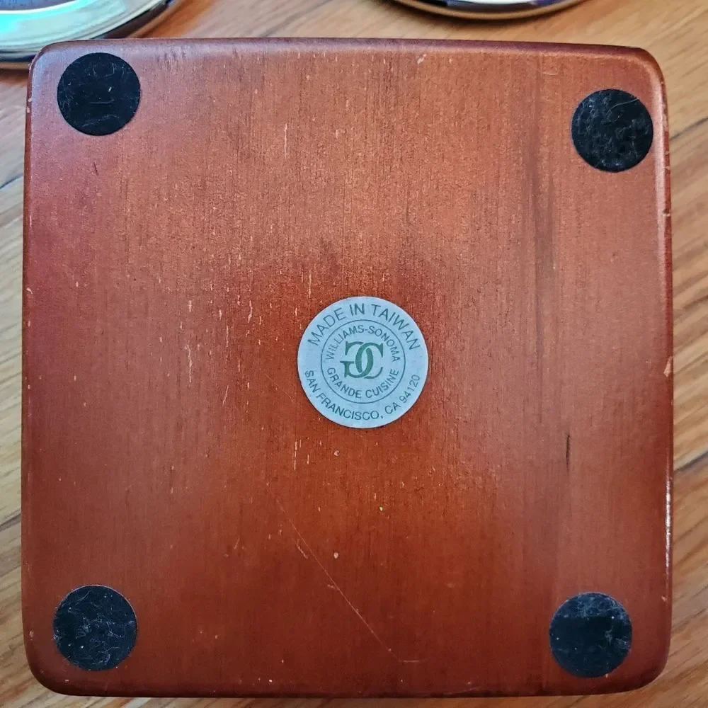 Williams Sonoma wood and metal round coaster set of four with‎ holder